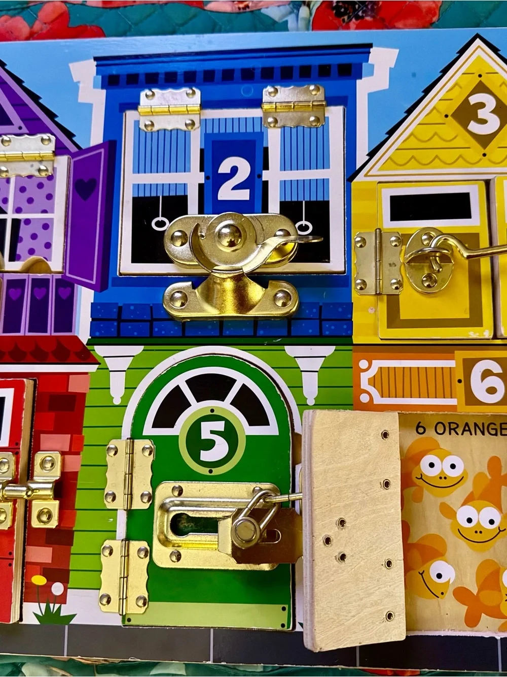 Melissa & Doug latches Kids Busy Board with Locks and Latches!